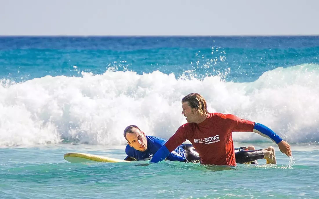 surf lesson at the beach of fuerteventura