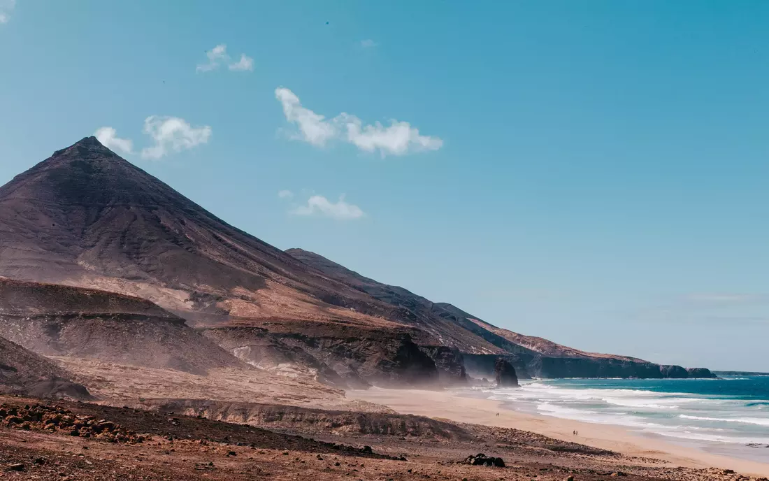 The contrast between the rugged volcanic rock and azure water is breathtaking!