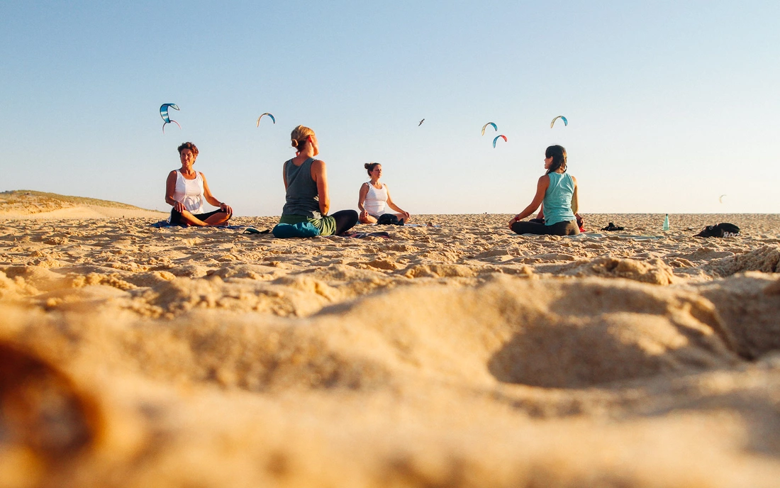 We offer yoga classes on the beach,