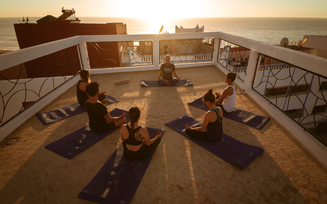 surf camp morocco yoga roof top