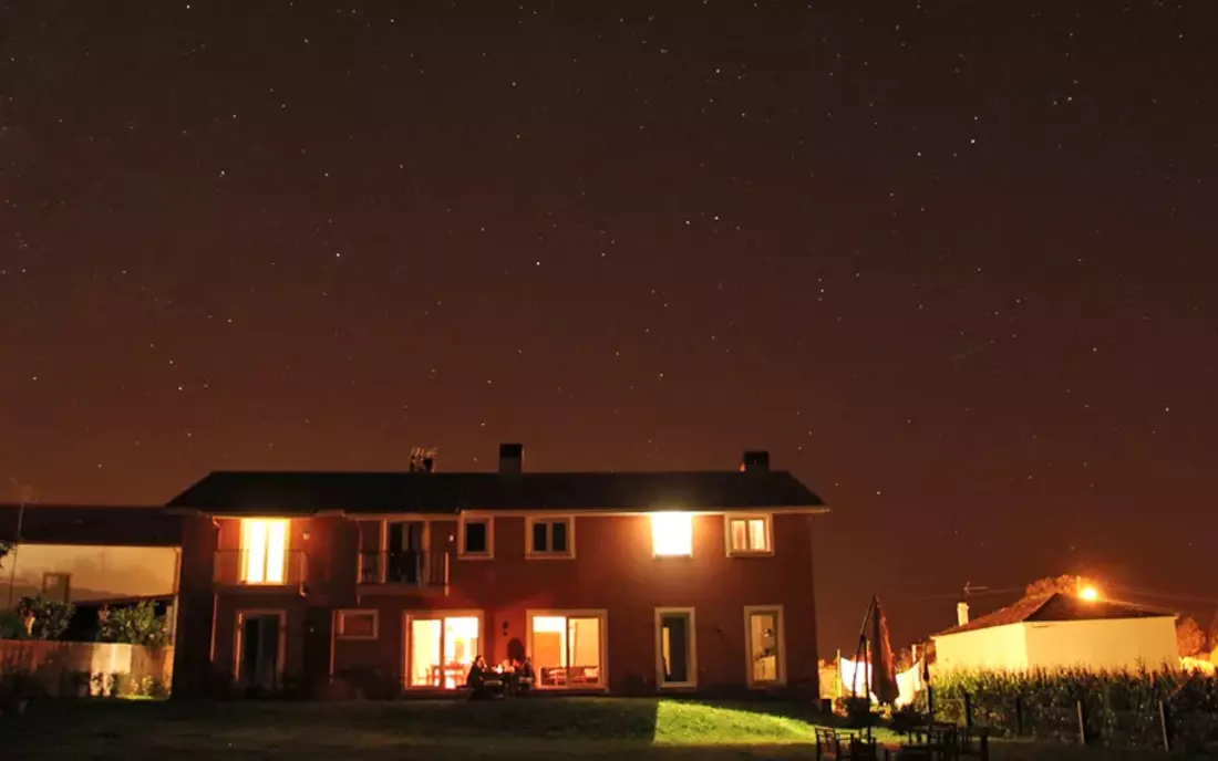 surf house galicia at night