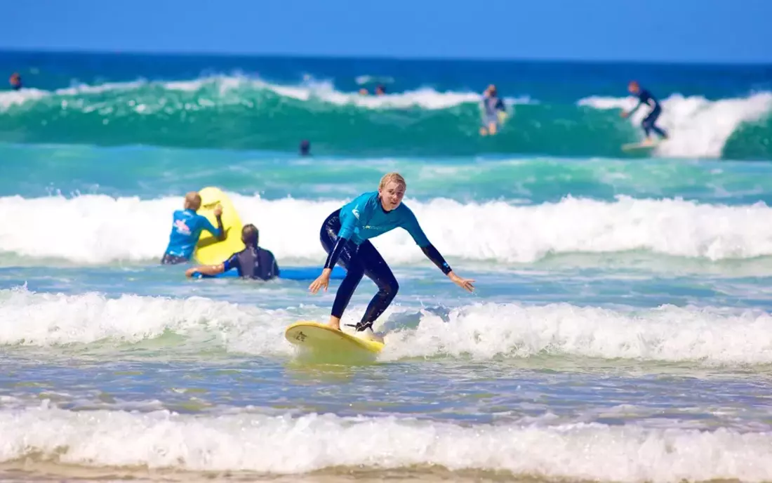 surf student learning to surf