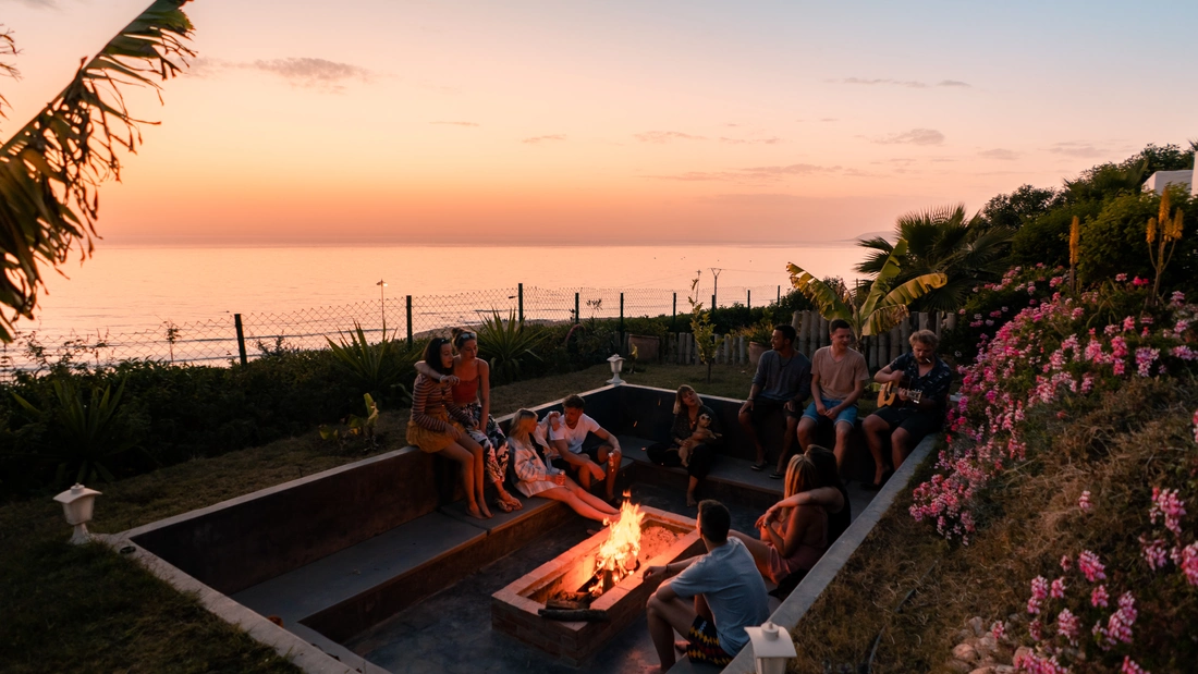 Campfire, the sound of the sea and guitar music