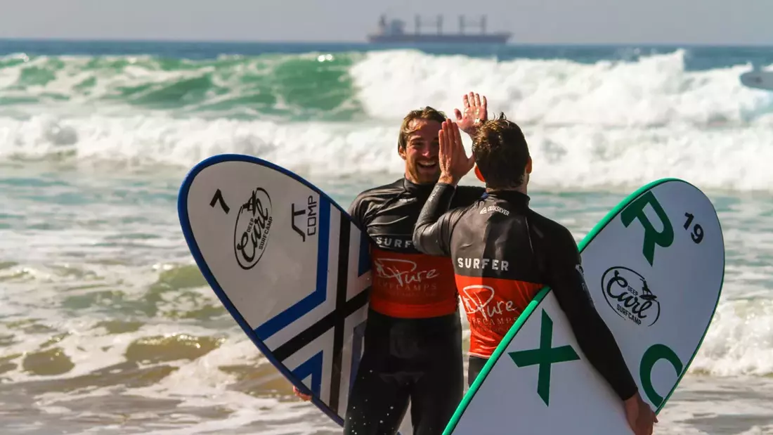 High five after the surf session