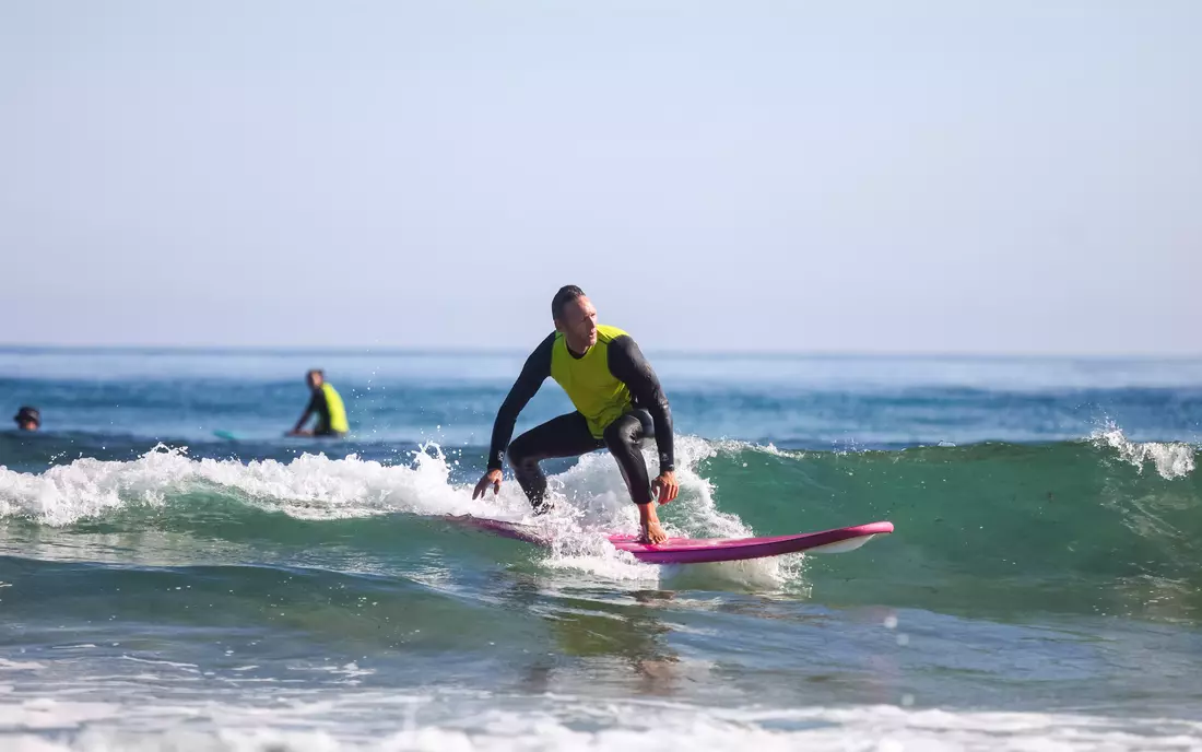 surfing at surf camp oyambre in northern spain