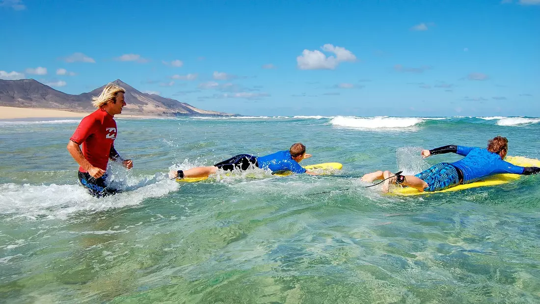 surf lesson at the beach of fuerteventura