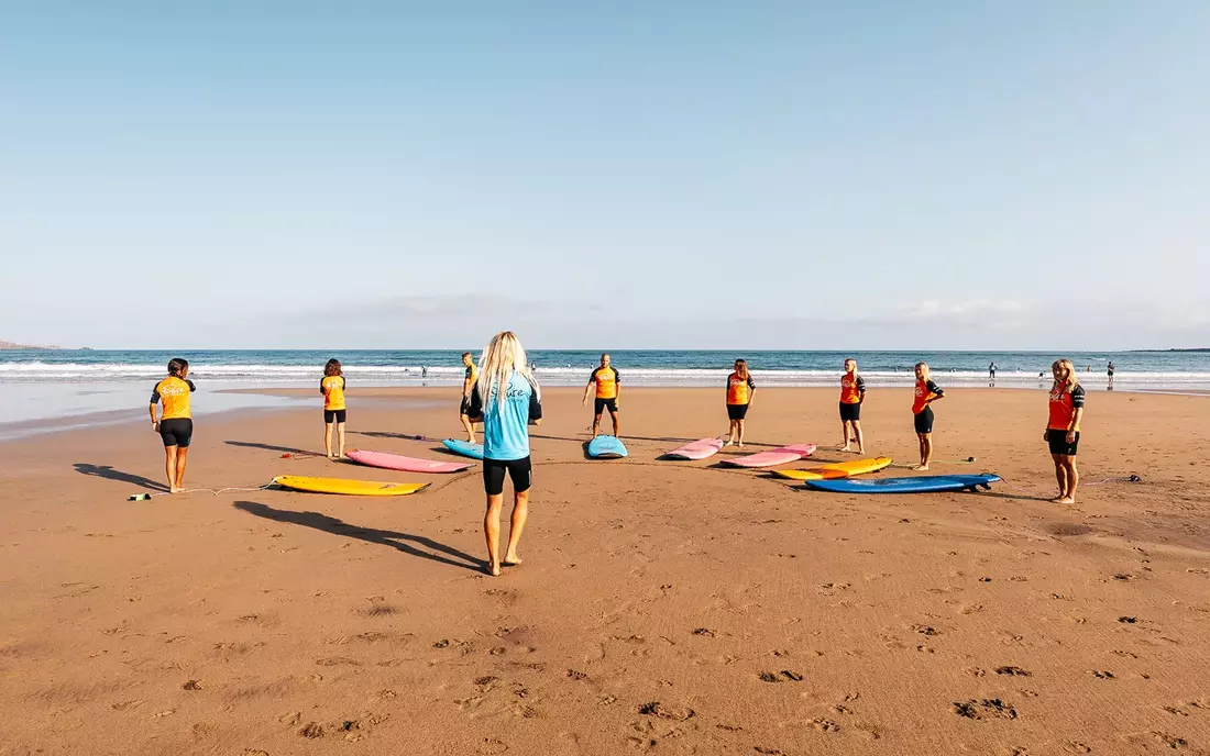 Before surfing, there is a warm-up on the beach