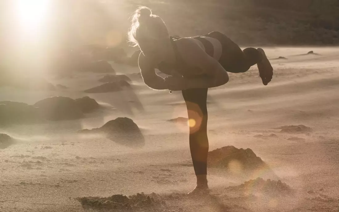 Yoga in the pale light of the sun.