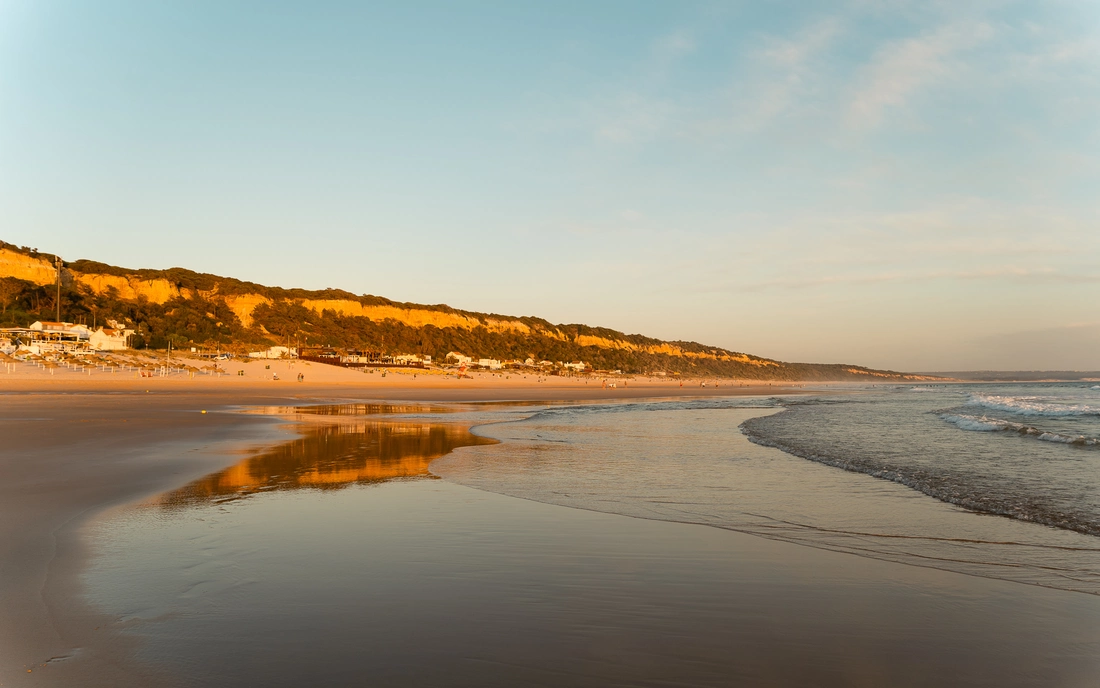 The home beach of Beachfront Surfcamp Caparica