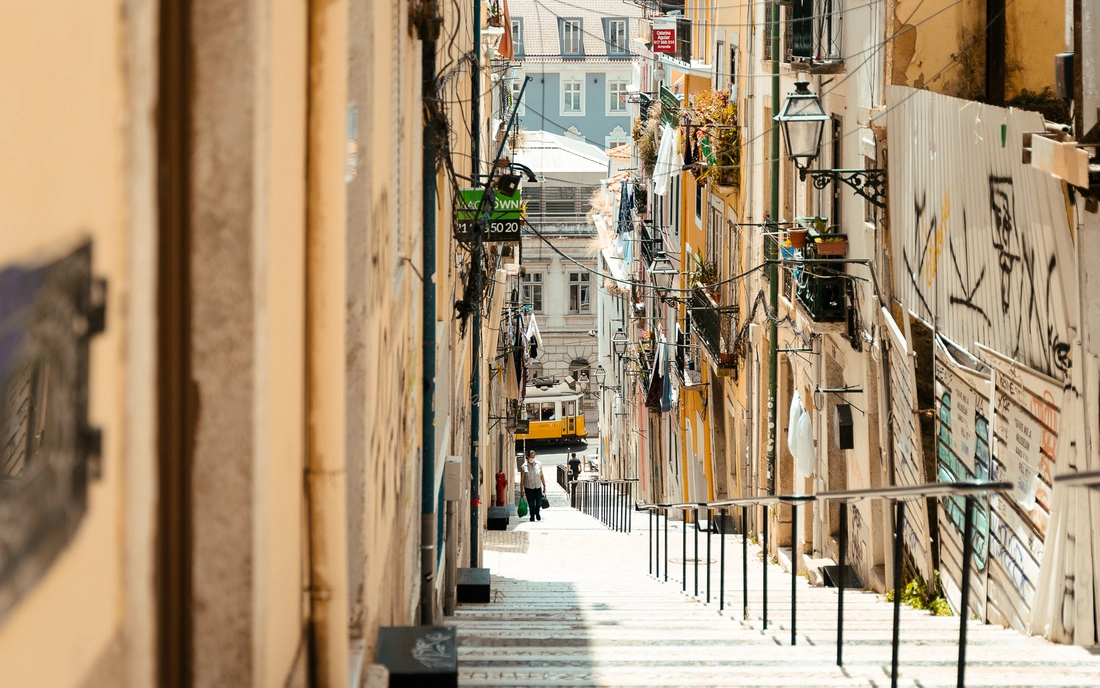 Narrow streets, colorful tiles and old trams