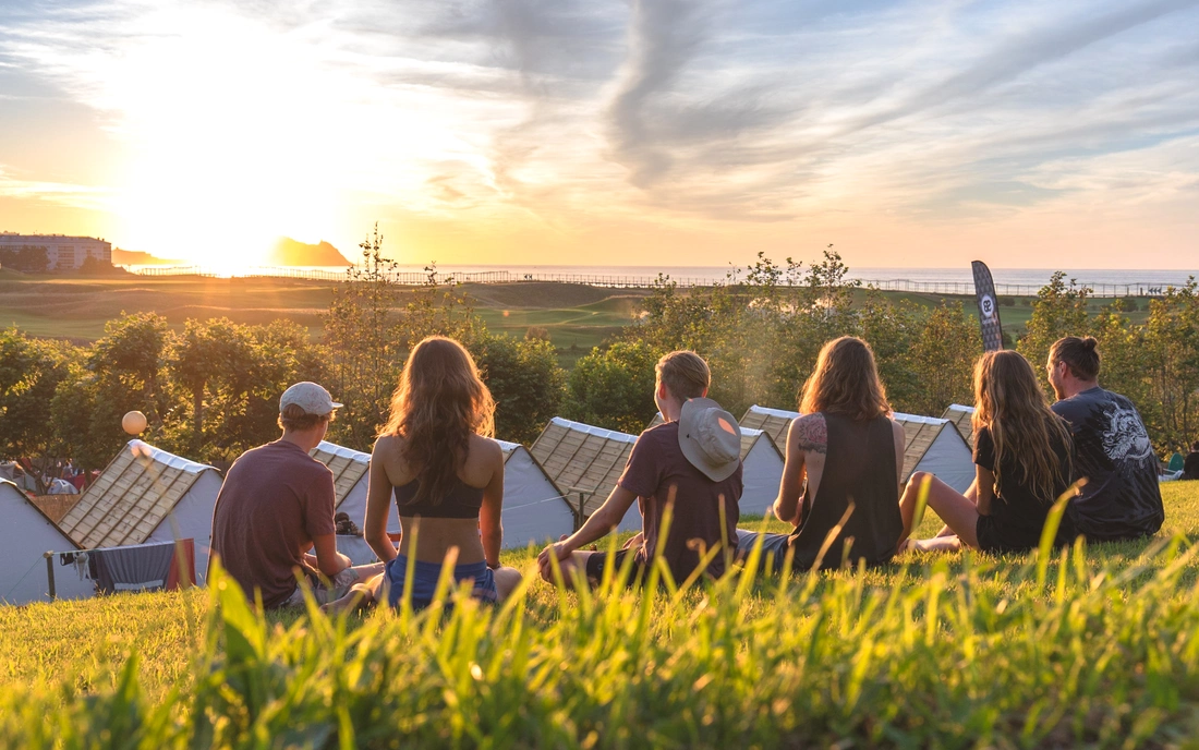 people watching sunset in galicia