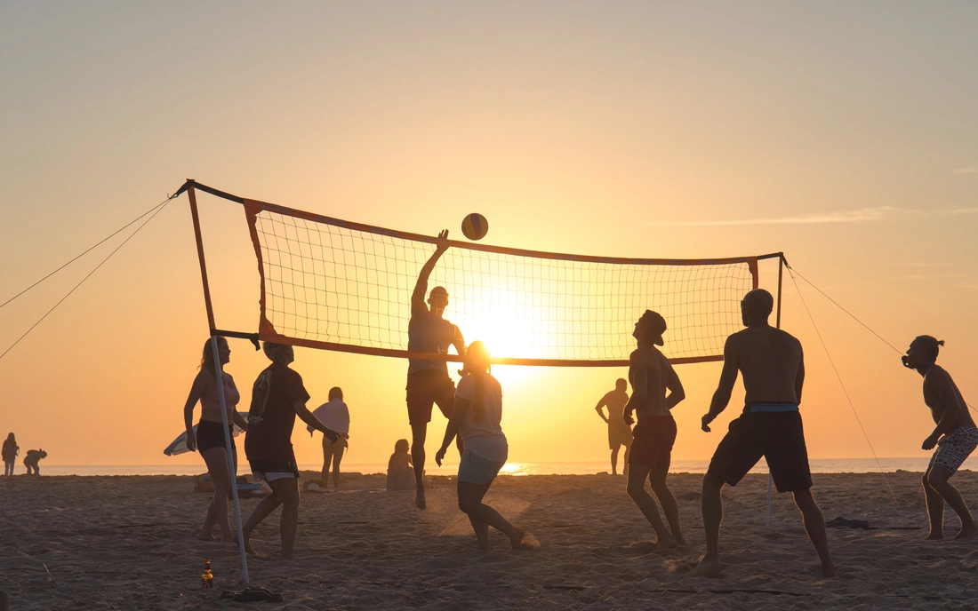 beach volleyball at sunset