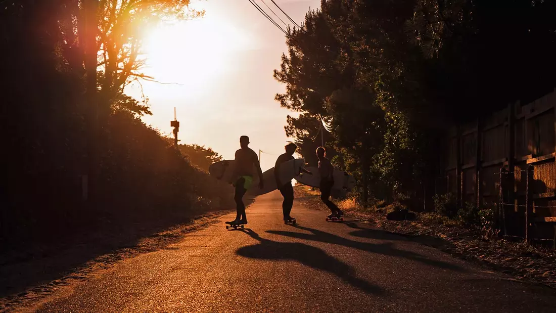 With the longboards to the surf spot