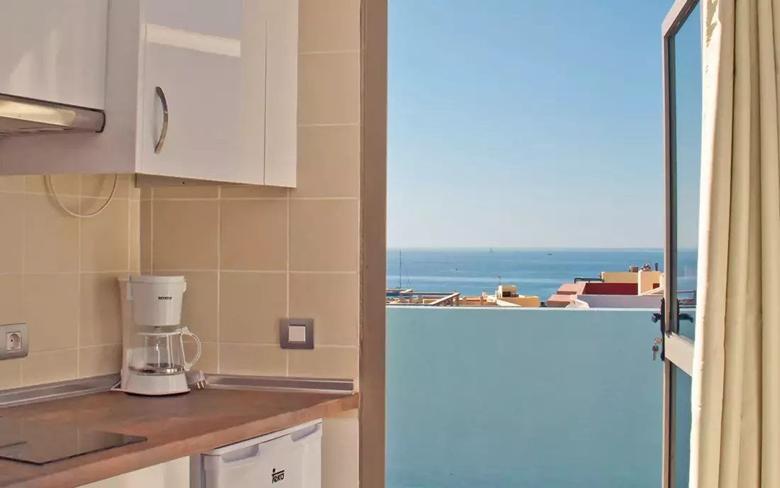 kitchen with sea view at apartment in surf camp fuerteventura