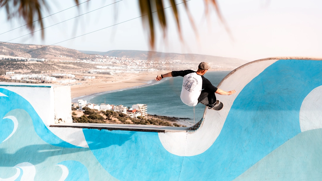 Skating by the sea under palm trees