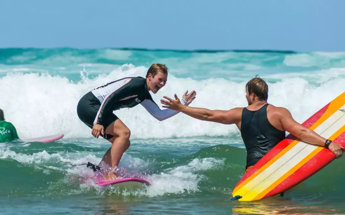 High 5 surf school smile