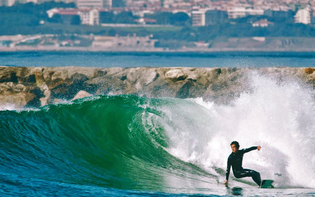 Surfing Portugal bottom turn