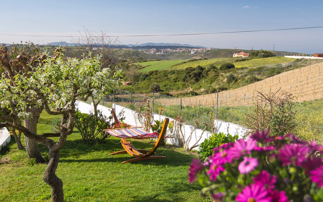 Surf house Ericeira Portugal garden chill hammock